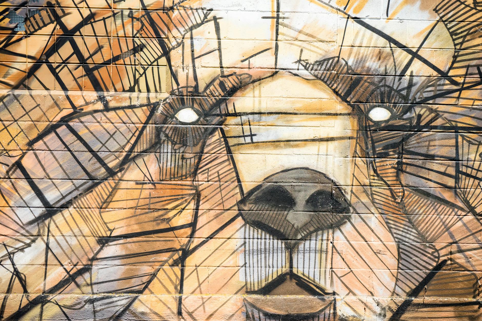 brown and black animal shape artwork painting
